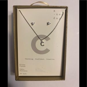 Silver letter “c” necklace with matching earrings